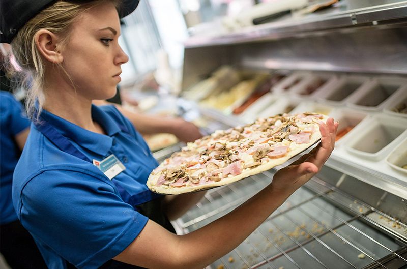 Domino's franchise conditions and cost